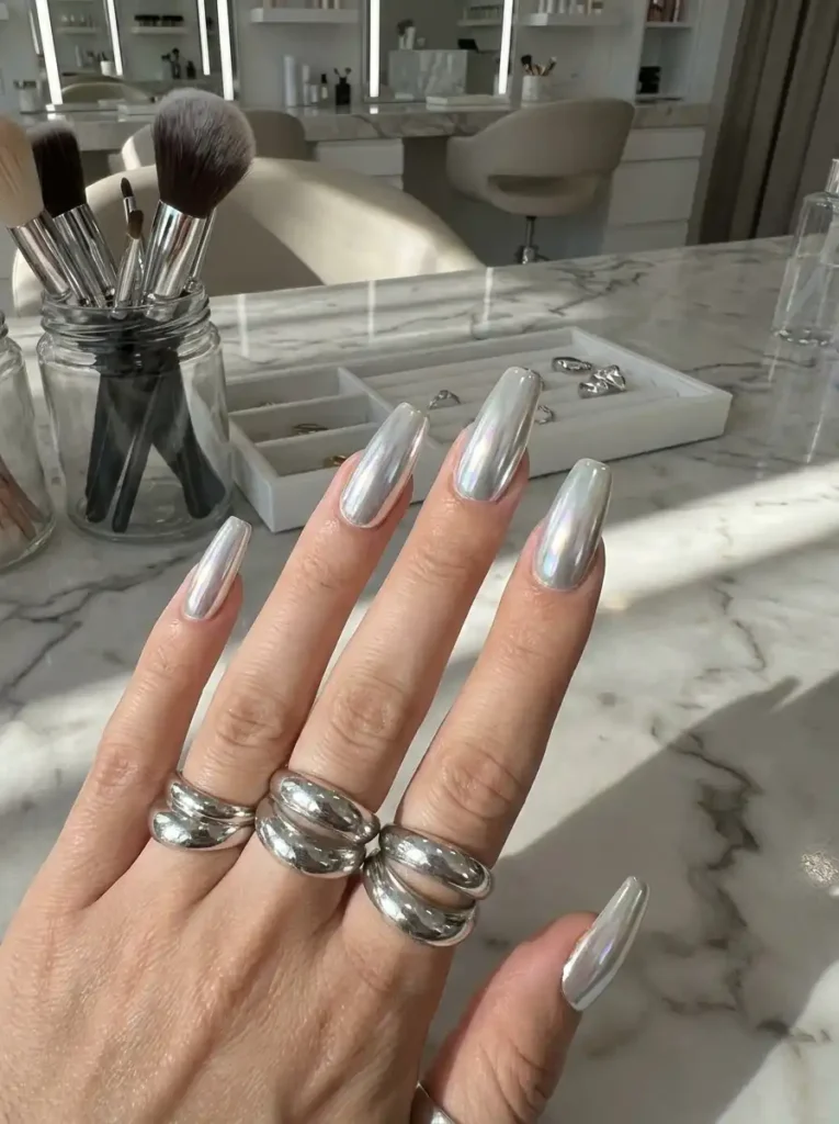 13. Glossy Chrome Mirror Nails