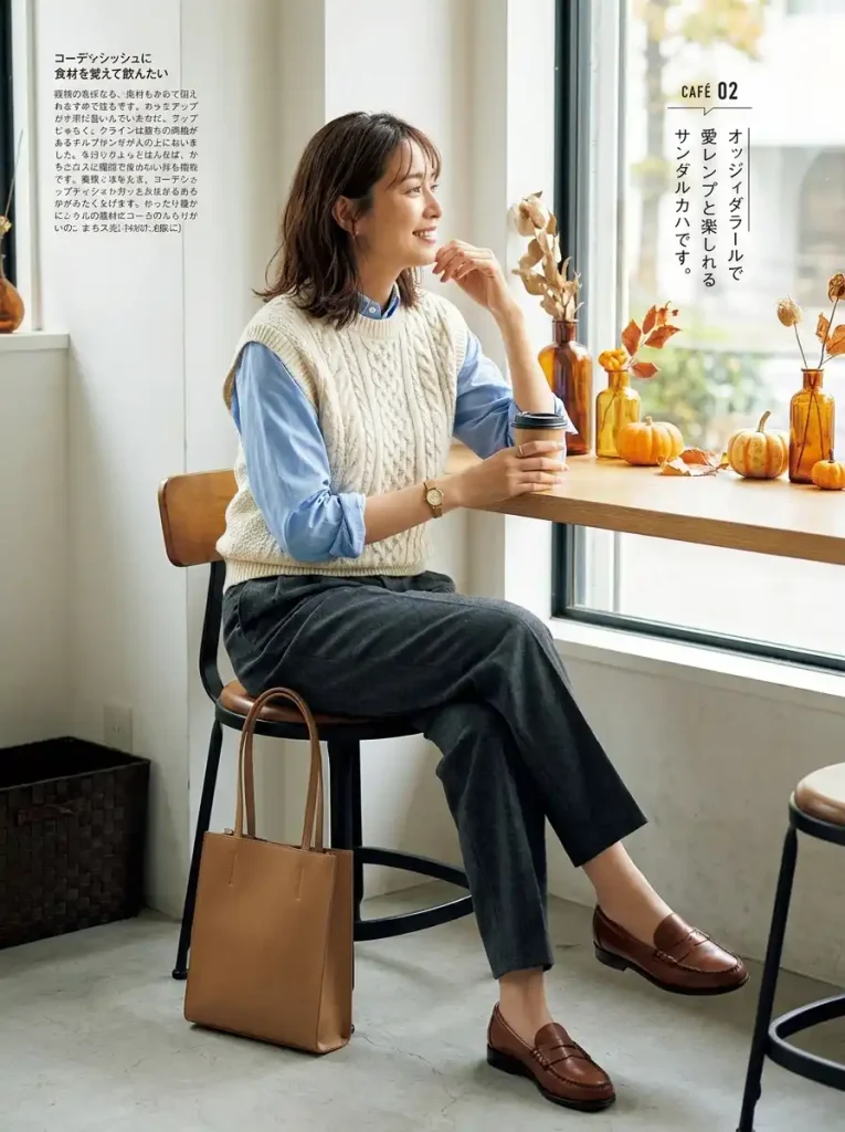 19. Ivory Sweater Vest with Pleated Trousers