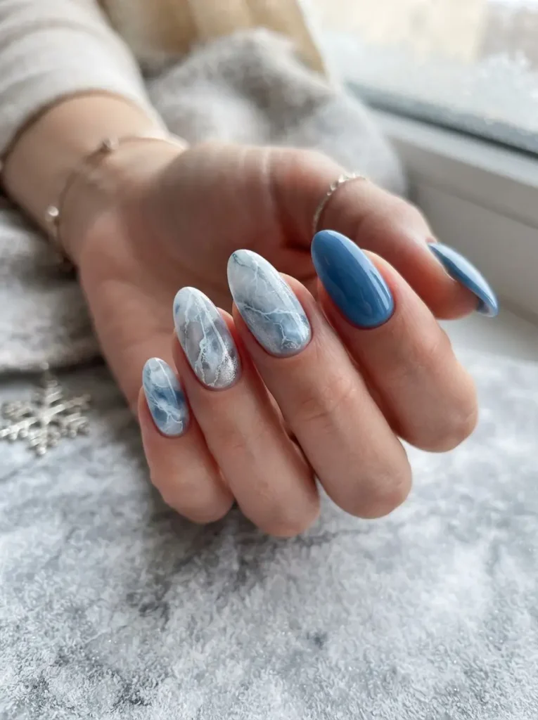 10. Blue Marble Winter Nails