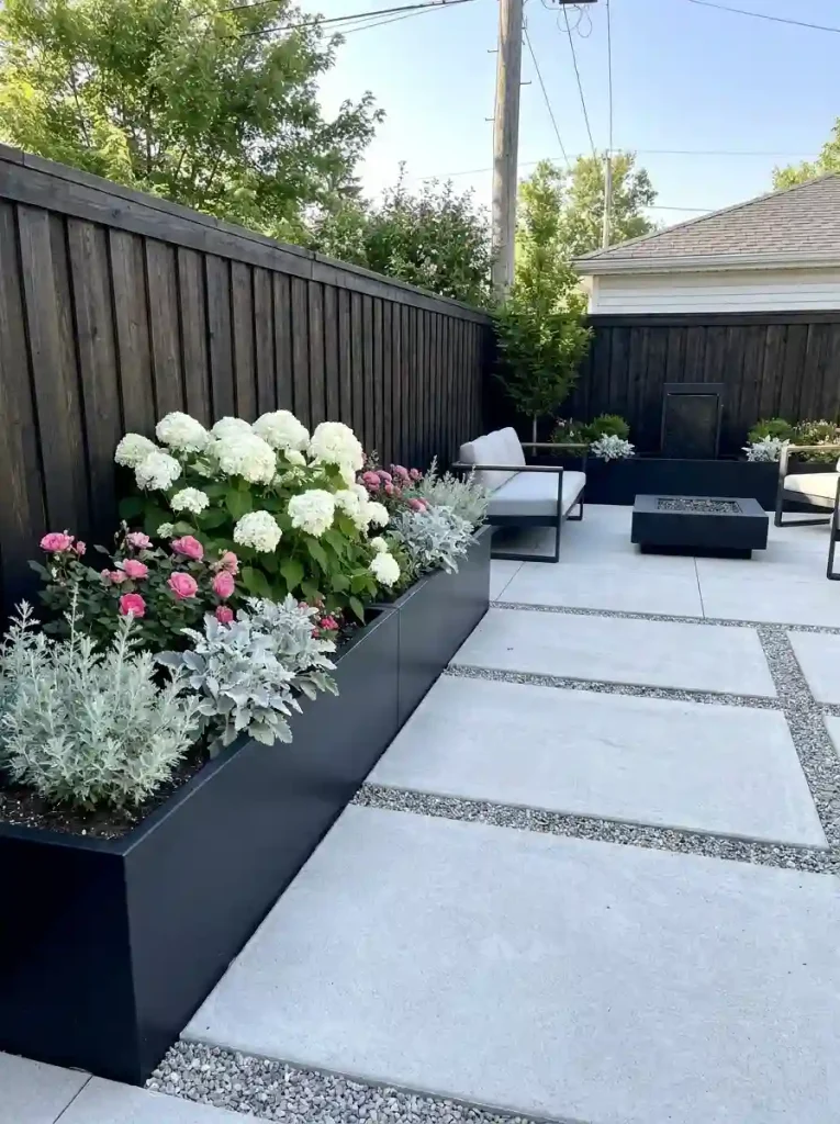 9. Black Raised Beds for a Dramatic Modern Contrast